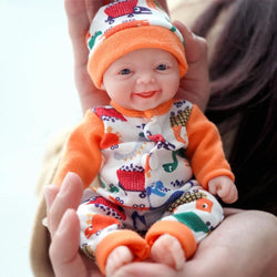Miaio Reborn Silicone Baby Doll Boy 7 Inch Doll Mini Realistic Newborn Baby Dolls Full Body Stress Relief for Adults Hand Made with Feeding & Bathing Accessories