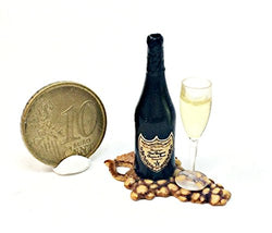 Open champagne with glass on grape Boards. Dollhouse miniature 1:12