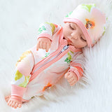 XFEYUE 10 Inch Newborn Reborn Baby Doll and Clothes Set Washable Realistic Soft Silicone Sleeping Baby Doll with Beautiful Flower Pattern Jumpsuit and Hat-Best Gift for Kids Girls