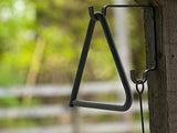 Triangle Dinner Bell made of Chuckwagon Cast Iron - Includes Medal Hanger and Call Striker