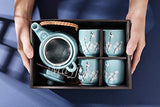 Mayjo Japanese Tea Service Set Teal with White Plum-Flower Ceramic Tetsubin Teapot & 4 Teacups Tea Set With Stainless Steel Infuser & Rattan Handle Included in Gift Box