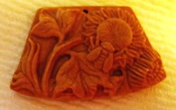 Intricately Carved Sunflower and Bee in Red Malachite Pendant Focal Bead 2.25" x 1.5" x .25"