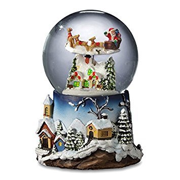 The San Francisco Music Box Company Santa Flying Over Village Snow Globe