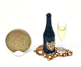 Open champagne with glass on grape Boards. Dollhouse miniature 1:12