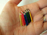 Miniature box of pencils. Wooden dollhouse accessories for nursery school and office.