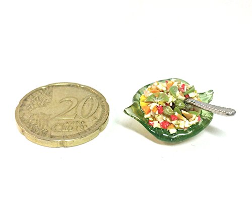Fruit salad on a leaf. Dollhouse miniature 1:12