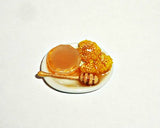 Plate with honey and honeycomb. Dollhouse miniature 1:12