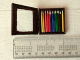 Miniature box of pencils. Wooden dollhouse accessories for nursery school and office.