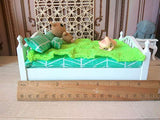 1:12 scale doll bed, dollhouse bedroom furnishing. White bed green mattress pillows blanket