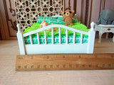 1:12 scale doll bed, dollhouse bedroom furnishing. White bed green mattress pillows blanket