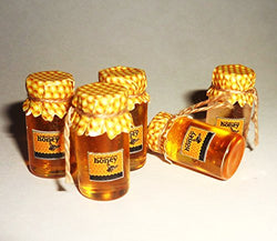 A jar of honey and jar of honeycomb. Dollhouse miniature 1:12
