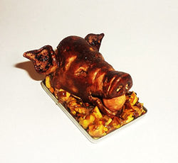 Roast pig's head in the tradition of England, Tudor. Dollhouse miniature 1:12