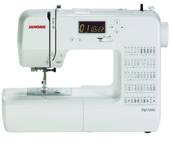 Janome DC1050 Computerized Sewing Machine with 1/4 Inch Seam Foot, 2ea Size and 12 Needle Pack